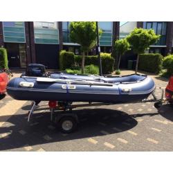 Rubberboot, met 8 PK kortstaart Buitenboord Motor én Trailer