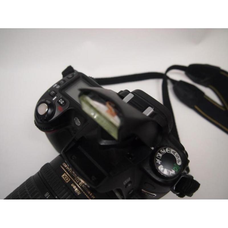 Nikon D80 met lens zonder lader (bovenop iets beschadigd)
