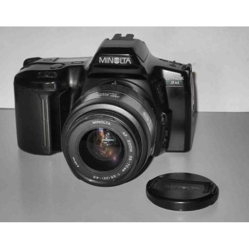 Minolta 3Xireflex camera +35 70 AF zoom+ flitser