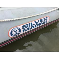 Rubberboot zilvermarine gebruikt voor karpervisser