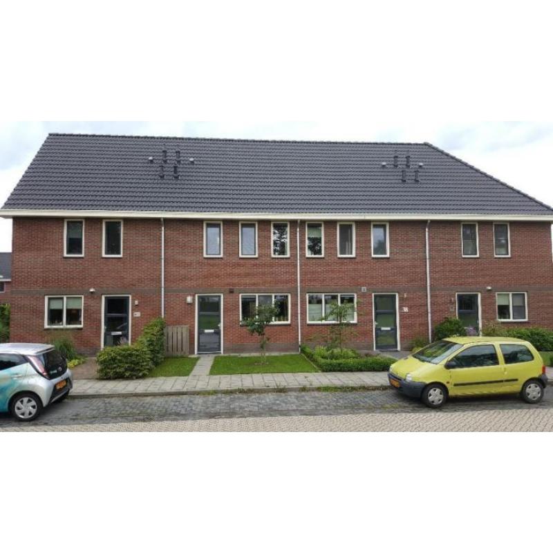 Ruime tussenwoning 2011 met vrij uitzicht nabij centrum Olst