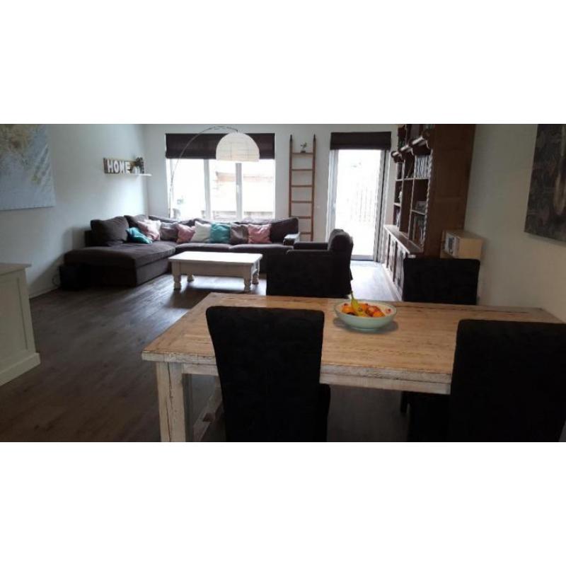 Ruime tussenwoning 2011 met vrij uitzicht nabij centrum Olst