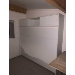Wit inklapbed incl matras met opbergruimte