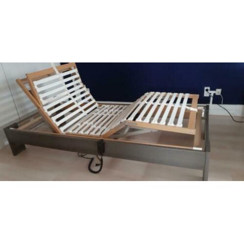 1 persoons bed met electrische lattenbodem.