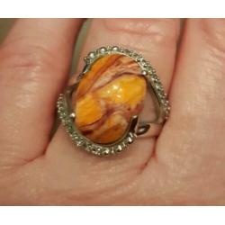 925 zilveren ring met Lion Paw Shell en witte topaas