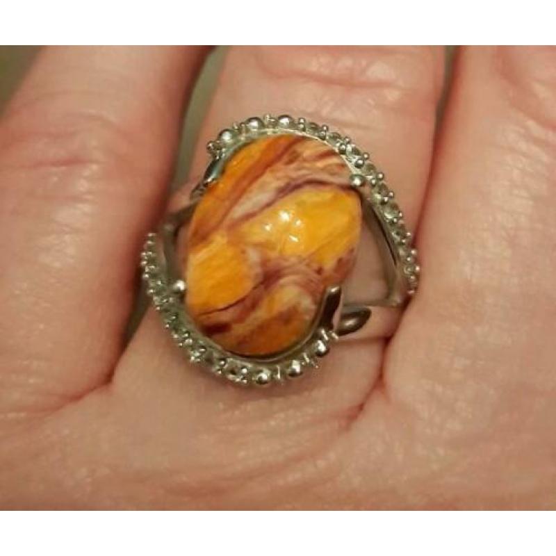 925 zilveren ring met Lion Paw Shell en witte topaas