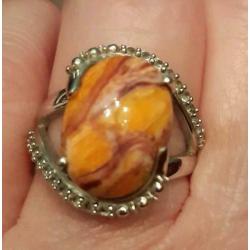 925 zilveren ring met Lion Paw Shell en witte topaas