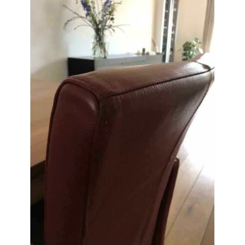 6 (Eetkamer)fauteuils op geremde parketwielen.