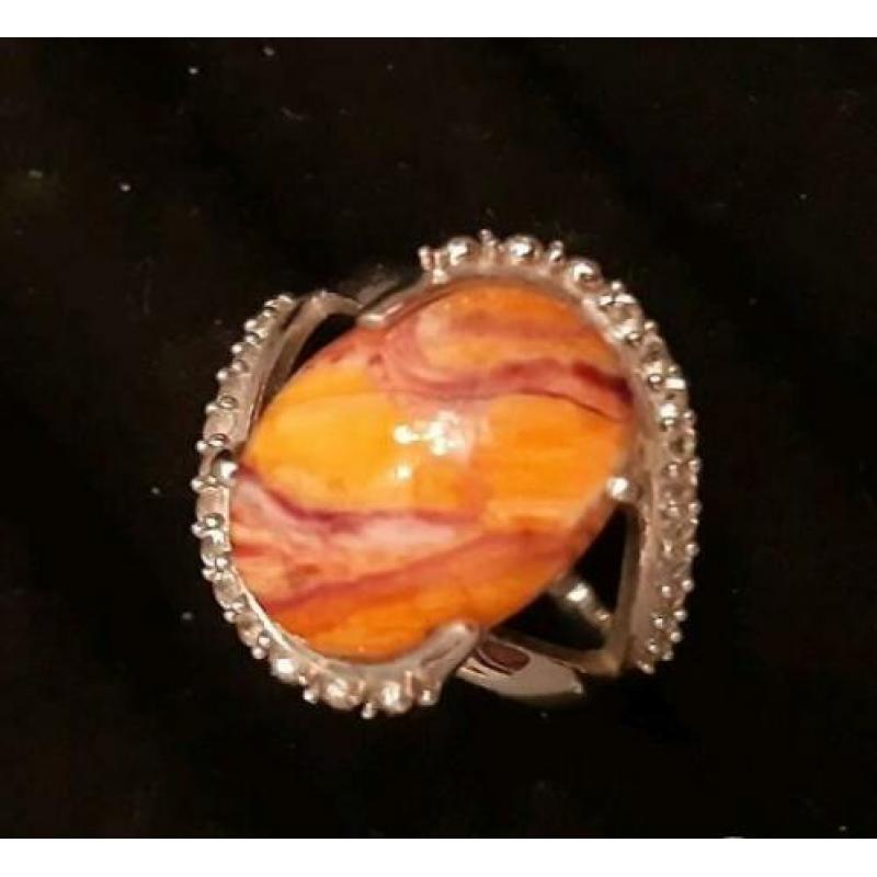 925 zilveren ring met Lion Paw Shell en witte topaas