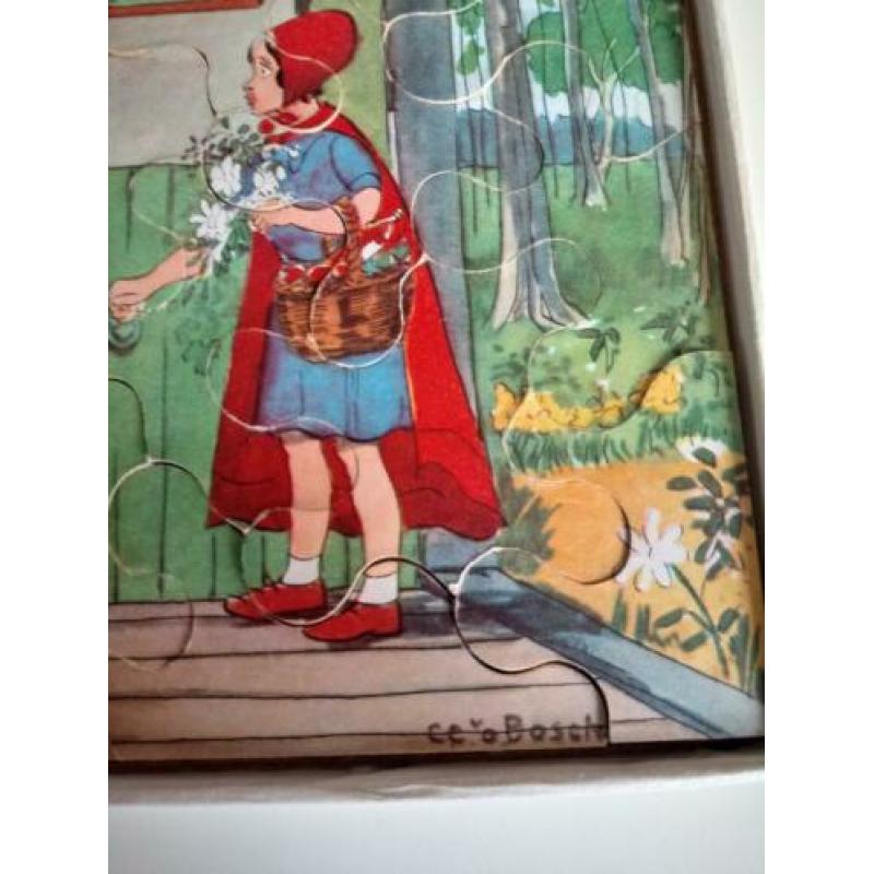 Puzzle.houten stukjes .15 x 20 cm.zeer oud