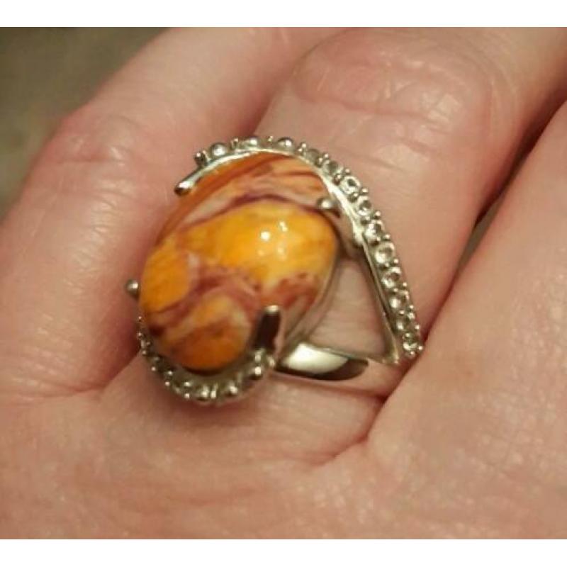 925 zilveren ring met Lion Paw Shell en witte topaas