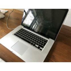 Oude MacBook Pro + oplader