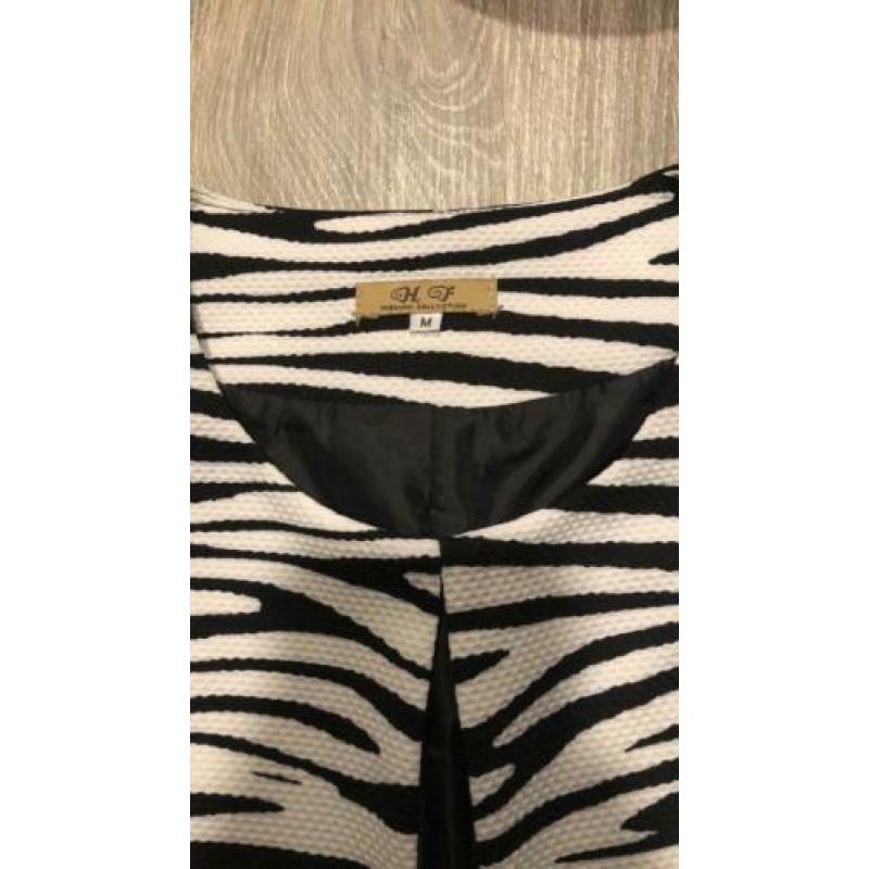 Zebra print jas met haak sluiting