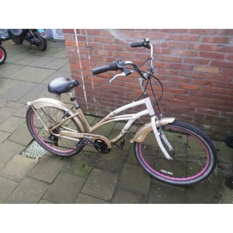te koop damesfiets cruiser fiets goud met wit