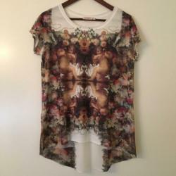 T shirt poolgirl maat valt als 38/40 rug schijnt door
