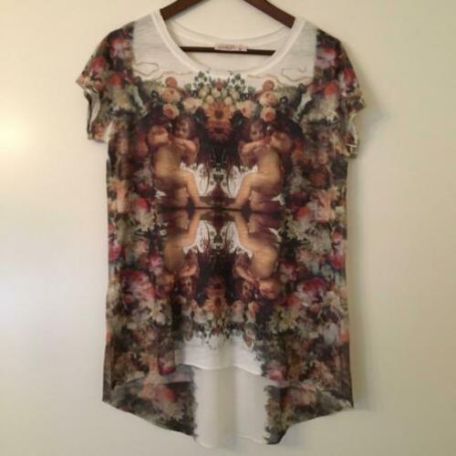 T shirt poolgirl maat valt als 38/40 rug schijnt door