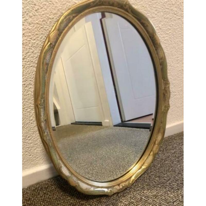 Antieke ovale spiegel met facetrand