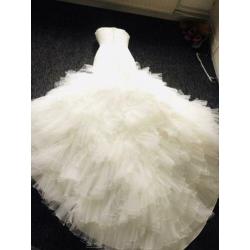 Ivoorkleurige mermaid trouwjurk mt 38/40 met sleep