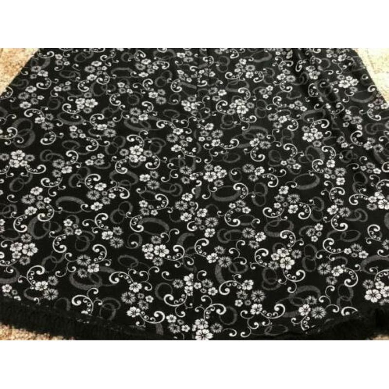 Rok maat 38.85 Cm lang, taille 30 cm rekbaar naar 55 cm