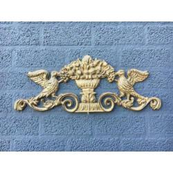 Wandornament gietijzer, licht met donker bruin-duif