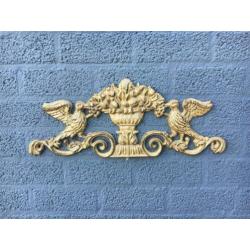 Wandornament gietijzer, licht met donker bruin-duif