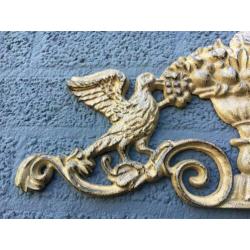 Wandornament gietijzer, licht met donker bruin-duif