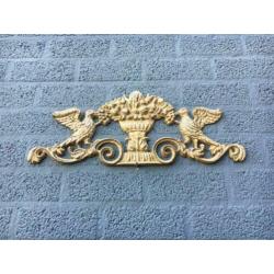 Wandornament gietijzer, licht met donker bruin-duif