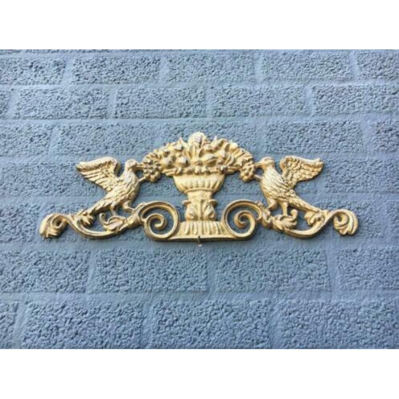 Wandornament gietijzer, licht met donker bruin-duif