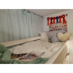 Hoogslaper zitje met tafel en logeerbed inéén