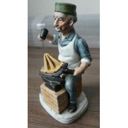 Beeldje wagenwielbouwer
