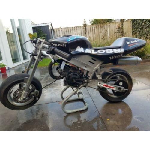 Minibike met veel onderdelen