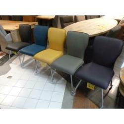 Nieuwe Eco-pu eetkamerstoelen met rvs poten en gelwielen