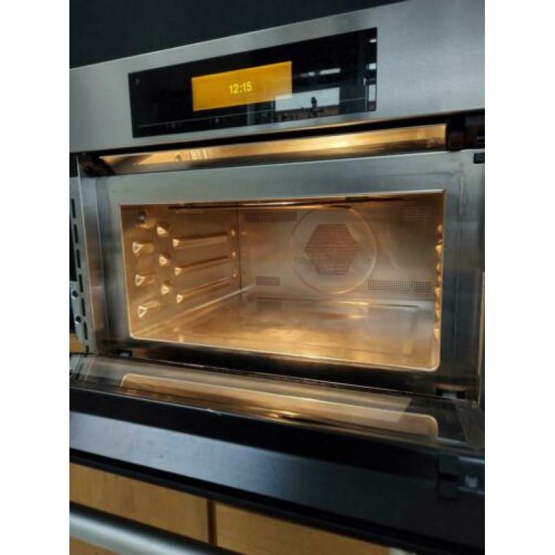 Zeer nette en luxe Miele combimagnetron vol opties. H5080BM