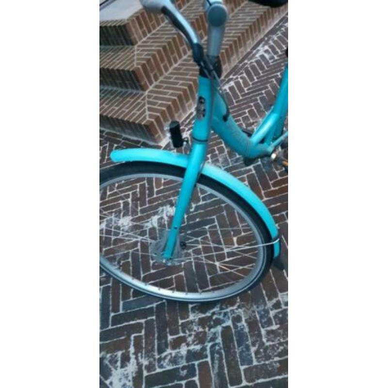 Lichtblauwe damesfiets