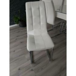 Hoogglans witte tafel met glasplaat en 4 eetstoelen