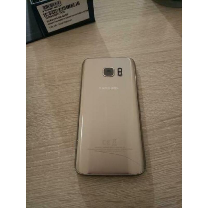 Samsung Galaxy S7 gold 32 gb.