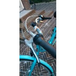 Lichtblauwe damesfiets