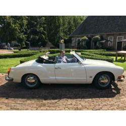 Witte Trouwauto met open dak, zelf rijden, te huur