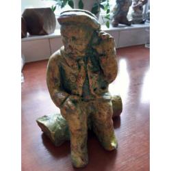 Steen beeld.Groen gele kleuren