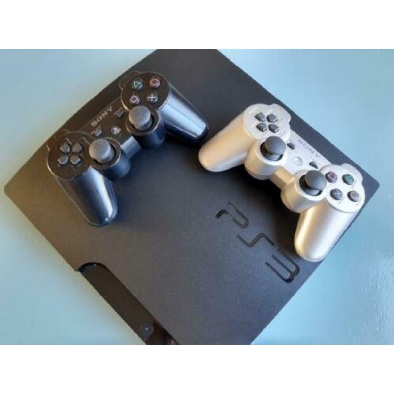 PS 3 met 2 controllers en div. spelletjes