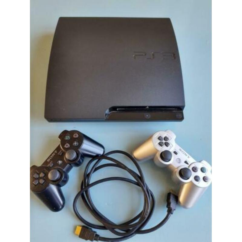 PS 3 met 2 controllers en div. spelletjes