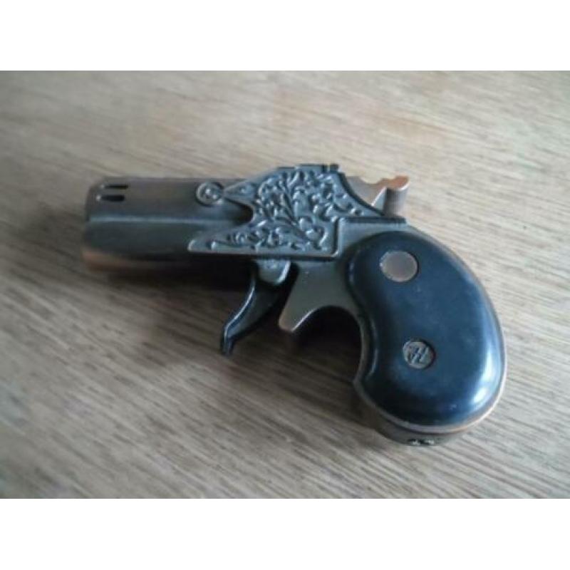 Aansteker. Antiek pistool
