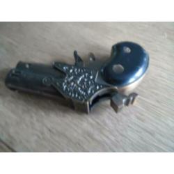 Aansteker. Antiek pistool