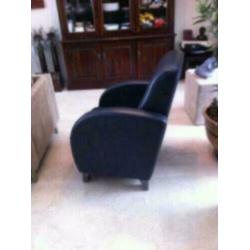 Leren fauteuil kleur blauw hoogte rug 100 cm breedte 75 cm.