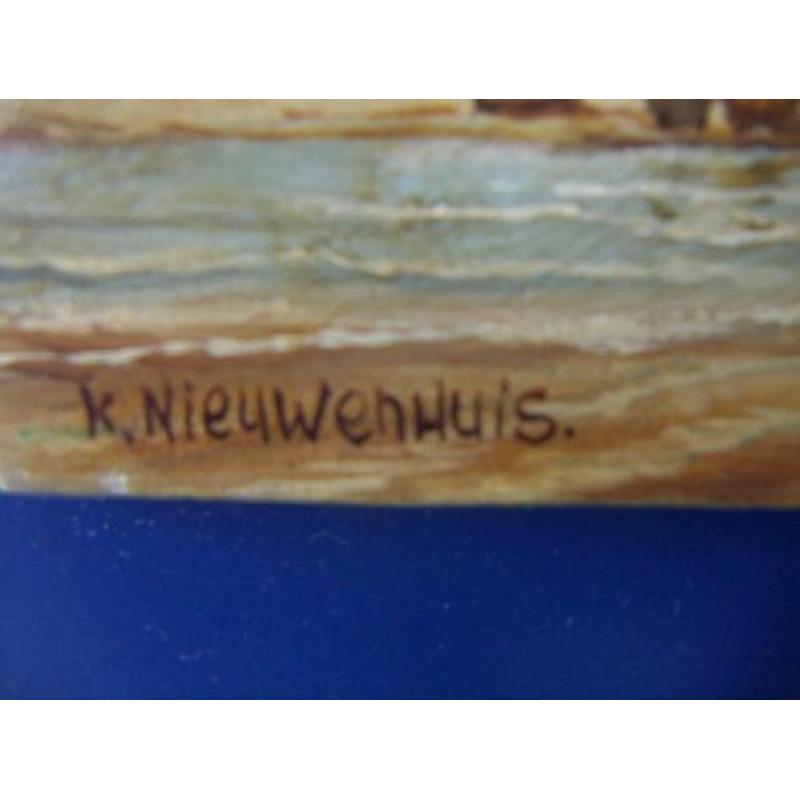 K. Nieuwenhuis olieverf op hout. Bomschuit op het strand.
