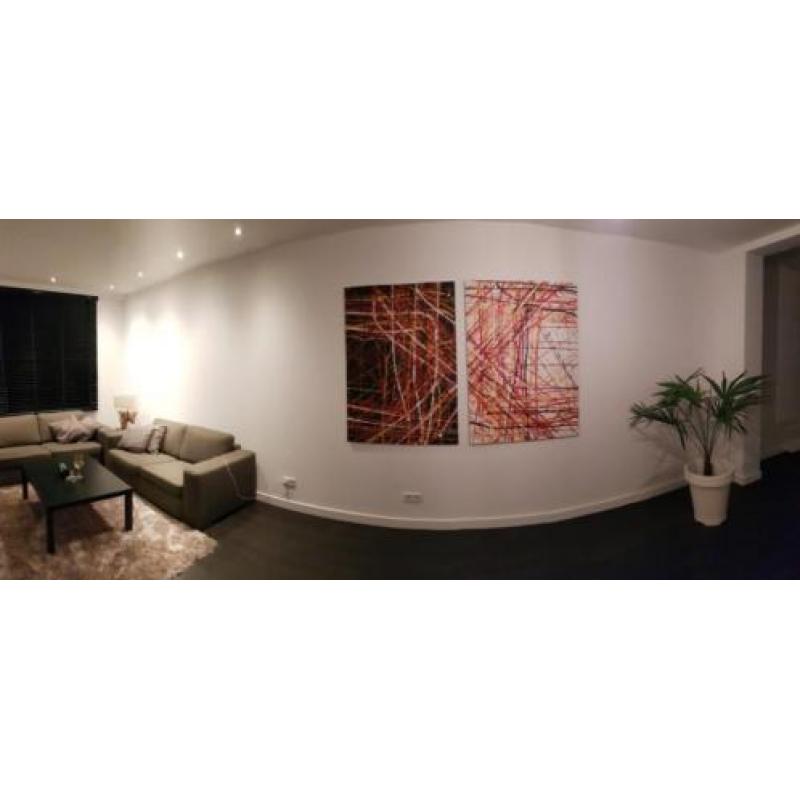 Groot abstract modern schilderij, 2 luik.