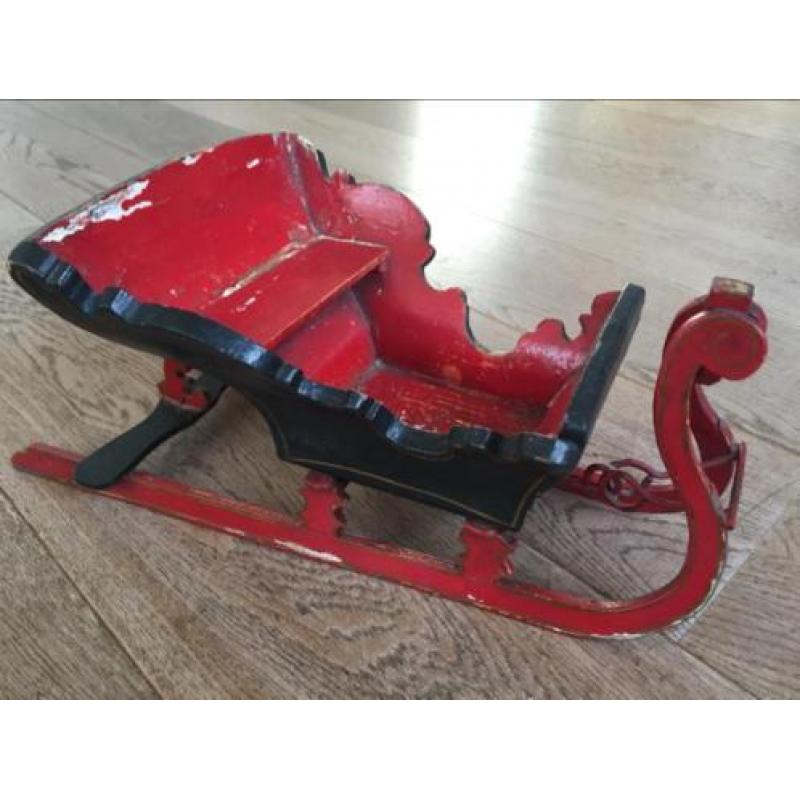 Antieke arreslee speelgoed kerstversiering slee