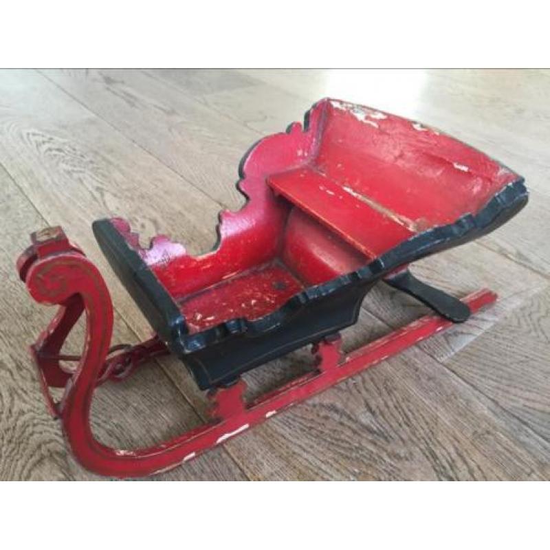 Antieke arreslee speelgoed kerstversiering slee
