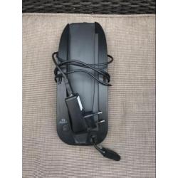 Zwarte PlayStation 3 met games en 2 controllers