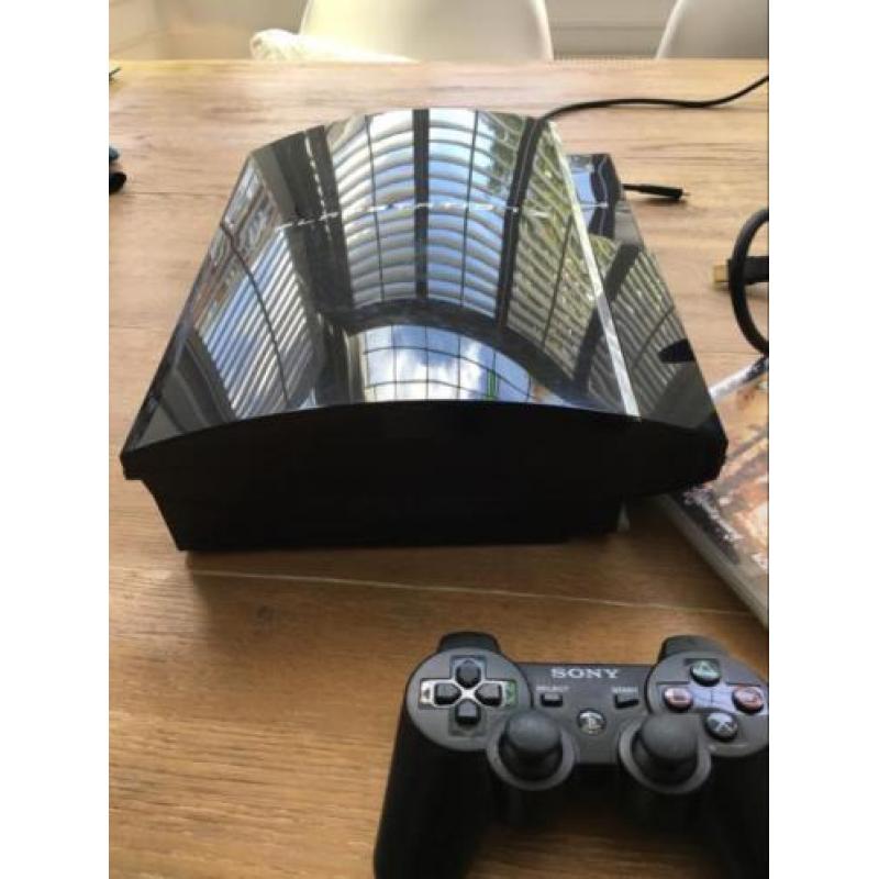 Playstation 3 in goede staat,kabels, controller, 2spellen